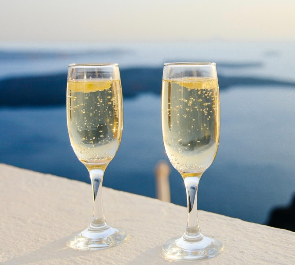 Champagne glasses - Buying a property in Spain